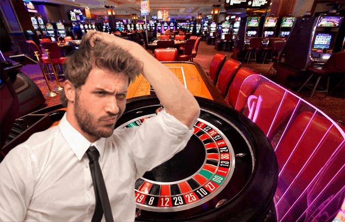 Confused Man by a Roulette Table