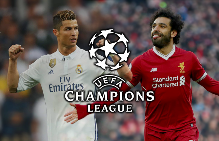 Cristiano Ronaldo and Mo Salah with the 2018 UEFA Championship League Logo
