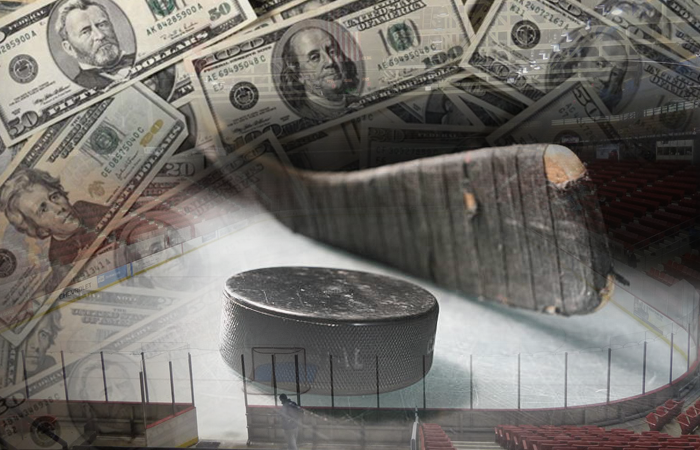 Hockey Puck and Stadium Surrounded By Money