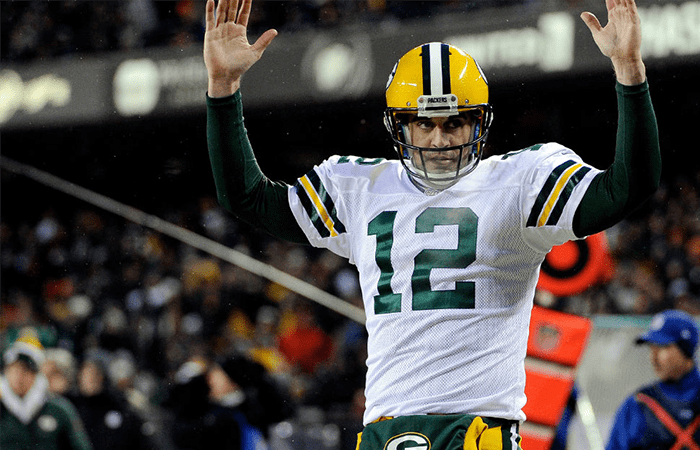 Aaron Rodgers Number 12 of the Green Bay Packers With His Hands Up