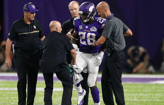 Adrian Peterson Being Walked Off The Field