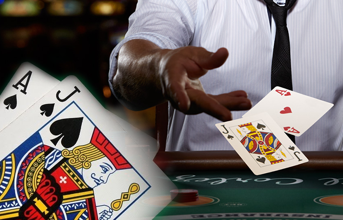 Man In Tie Throwing Blackjack Cards