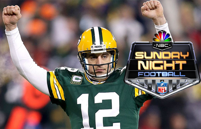 Aaron Rodgers of Green Bay Packers with Hands Up and the Sunday Night Football Logo
