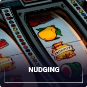 Nudge slot machine feature