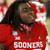 Rhamondre Stevenson playing for the Sooners