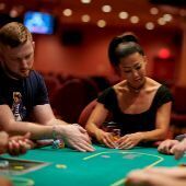Group of people playing Texas Hold'em
