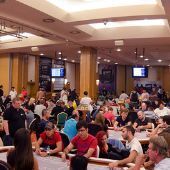 Poker room full of players