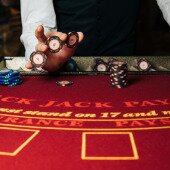 Dealer with blackjack chips