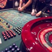 People playing at roulette table