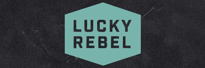 Lucky Rebel logo, dark background, green logo, dark "Lucky Rebel" text