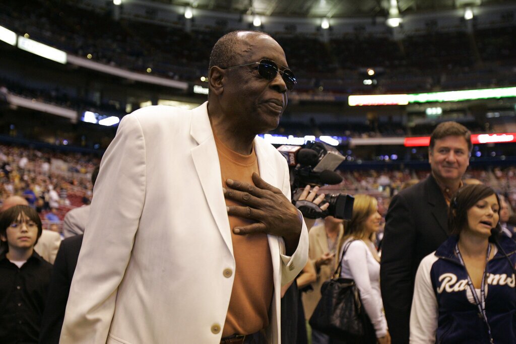 Former Rams defensive end David "Deacon" Jones is honored by having his number retired