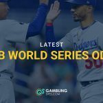 L.A. Dodgers manager Dave Roberts congratulates right fielder Mookie Betts