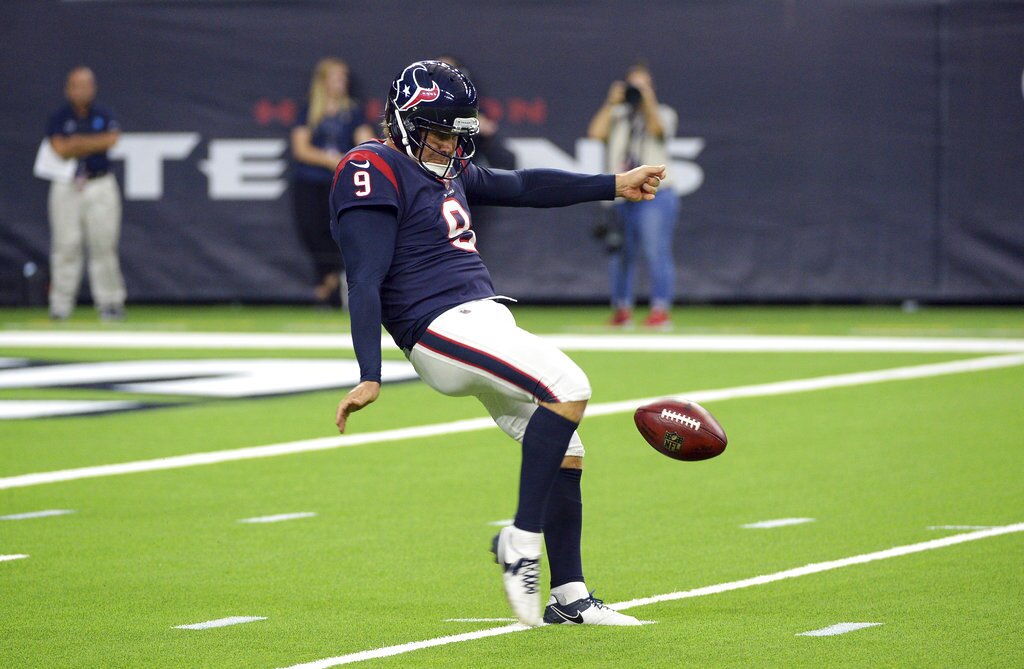 Houston Texans punter Shane Lechler punts
