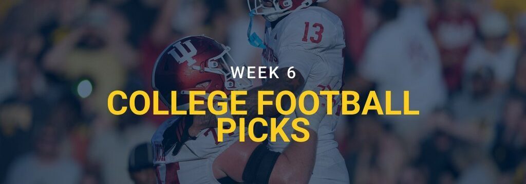 Indiana wide receiver Elijah Sarratt celebrates with teammate offensive lineman Bray Lynch