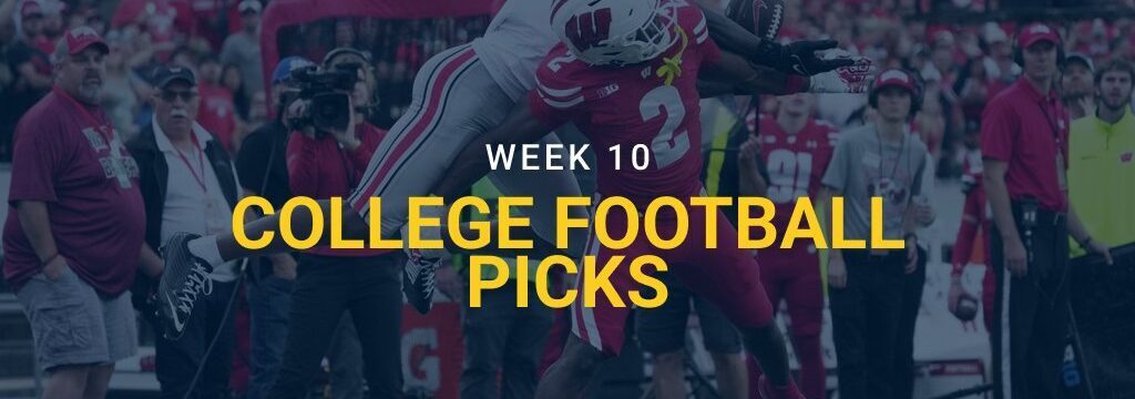 Wisconsin's Ricardo Hallman breaks up a pass intended for Ohio State's Jeremiah Smith