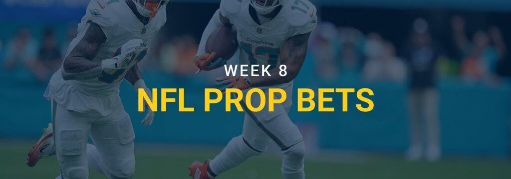 Miami Dolphins wide receiver Jaylen Waddle runs with the ball alongside teammate