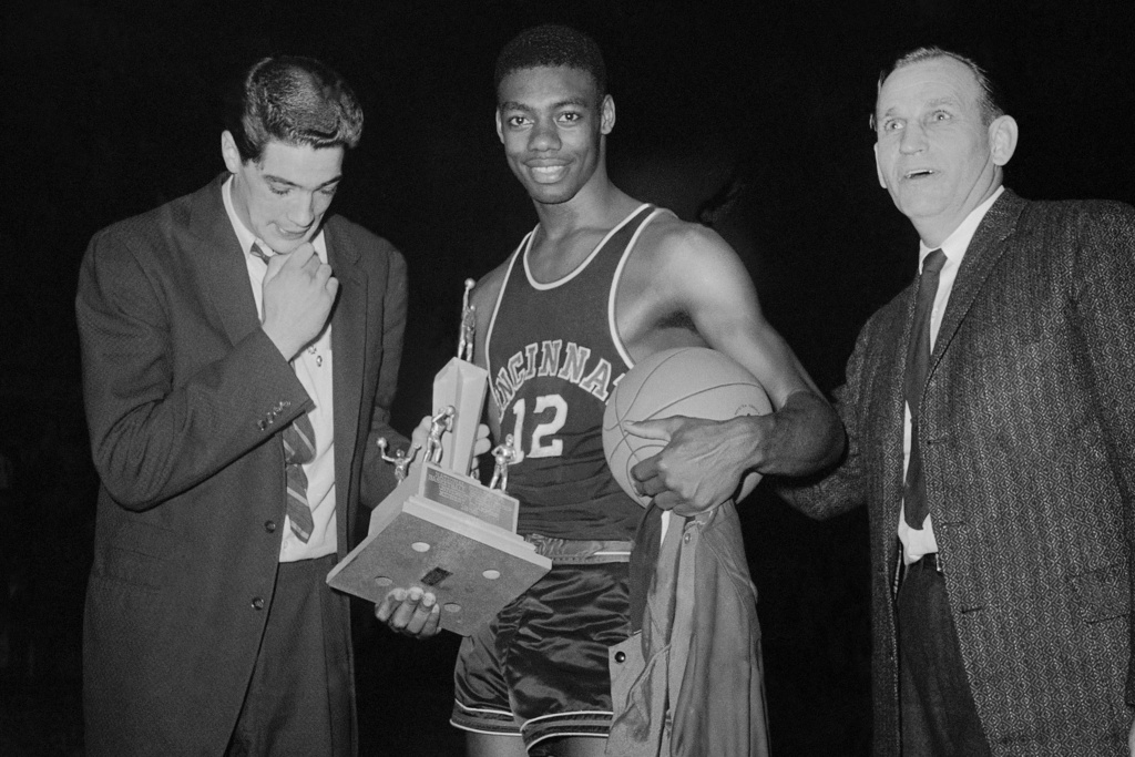 Oscar Robertson gets the championship team trophy