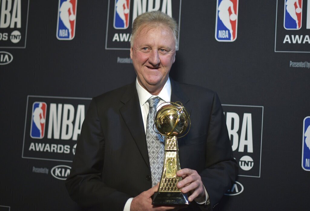 Larry Bird poses in the press room with the lifetime achievement award