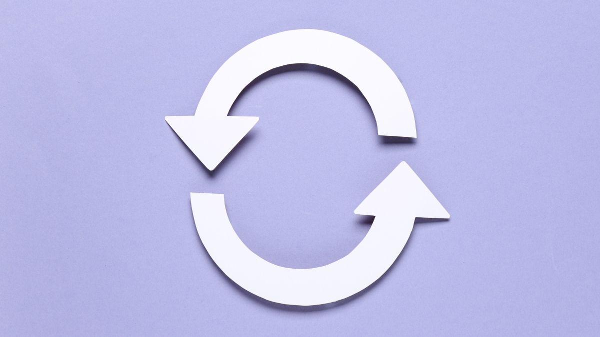 White circular arrows forming a loop on a light purple background