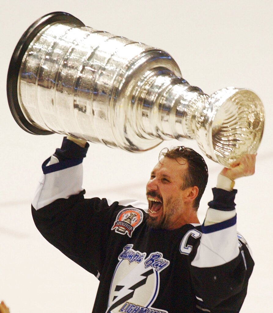 Tampa Bay Lightning captain Dave Andreychuk hoists the Stanley Cup