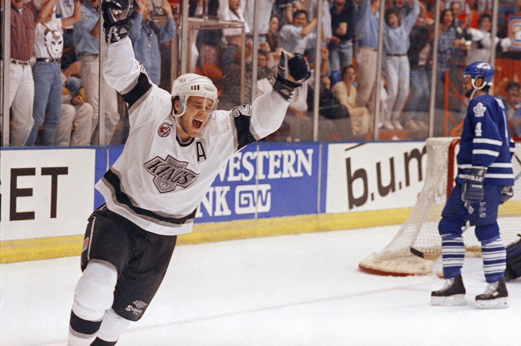 Los Angeles Kings left wing Luc Robitaille celebrates after making a goal