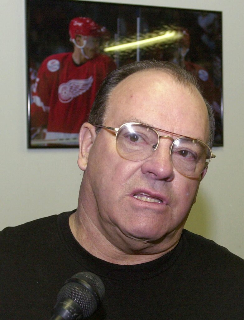 Detroit Red Wings coach Scotty Bowman speaks to the media