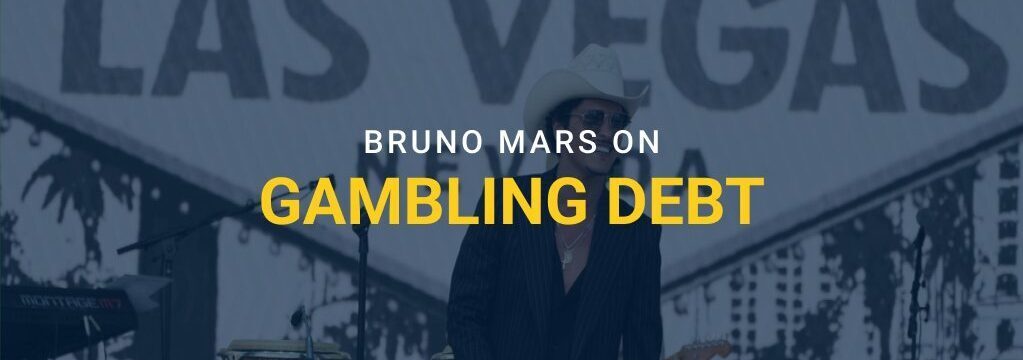 Bruno Mars performing on stage in front of a Las Vegas sign with text overlay “Bruno Mars on Gambling Debt” and GamblingSites.com branding