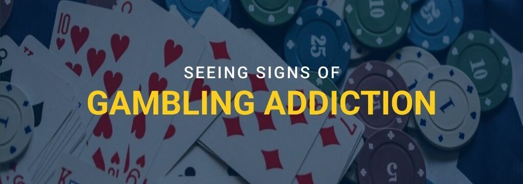 Playing cards and casino chips scattered on a table with text overlay “Seeing Signs of Gambling Addiction” and GamblingSites.com branding