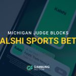 Michigan Judge Blocks Kalshi Sports Bets graphic over a blurred phone screen showing the Kalshi app listing.