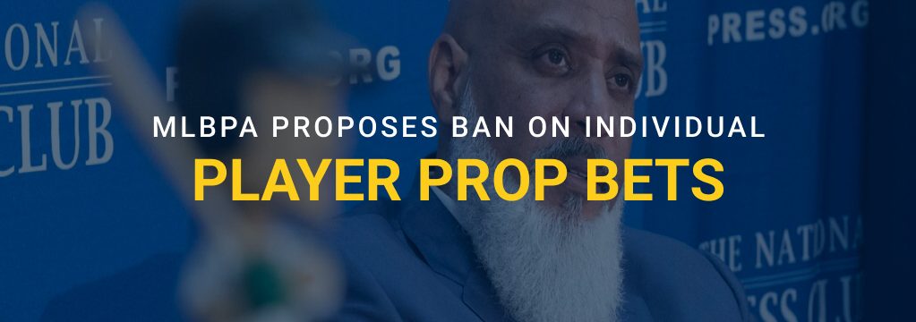 Man at a press conference with text reading “MLBPA proposes ban on individual player prop bets.”