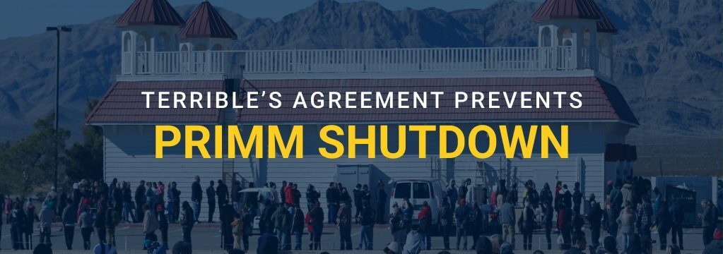 Feature image showing a crowd outside a Primm, Nevada building with mountains in the background and text reading “Terrible’s agreement prevents Primm shutdown.”