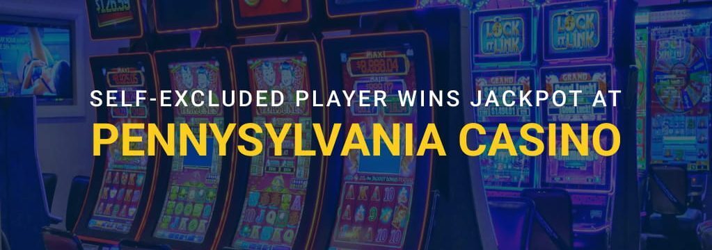 Slot machines inside a casino with text reading Self-Excluded Player Wins Jackpot at Pennsylvania Casino