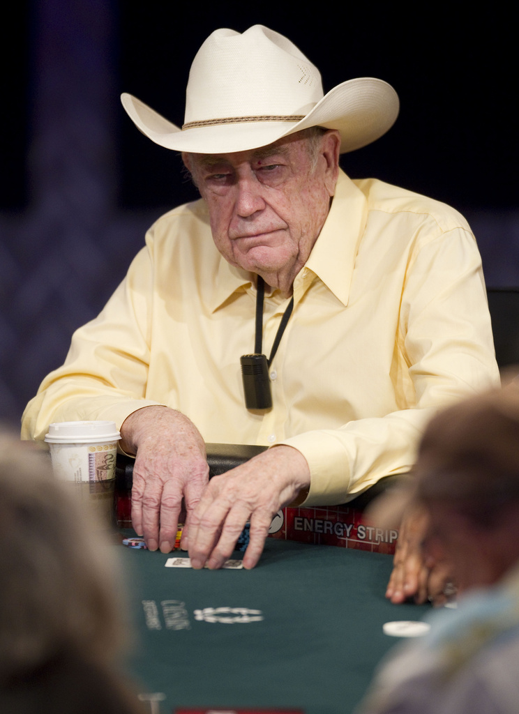 Doyle Brunson competes on the first day of the World Series of Poker