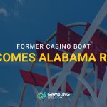 Close-up of a red and white riverboat paddle wheel with overlaid text reading “Former Casino Boat Becomes Alabama Reef” and the GamblingSites.com logo.