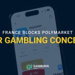 Smartphone displaying Polymarket with text reading “France Blocks Polymarket Over Gambling Concerns.”