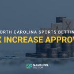 Stacked coins and tax blocks in a sports betting graphic with overlaid text reading “North Carolina Sports Betting Tax Increase Approved” and the GamblingSites.com logo.